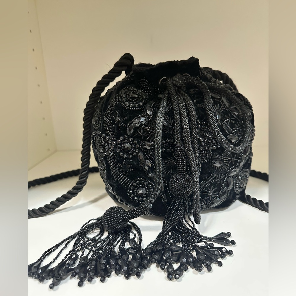 WHBM Sequin Bucket Bag in black
BRAND NEW WITH TAG